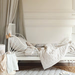 A stylish bedding set with quilted bedspread