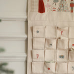 Christmas advent calendar with embroidered nutcracker pockets