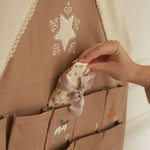 Gingerbread house advent calendar with cute embroidered pockets